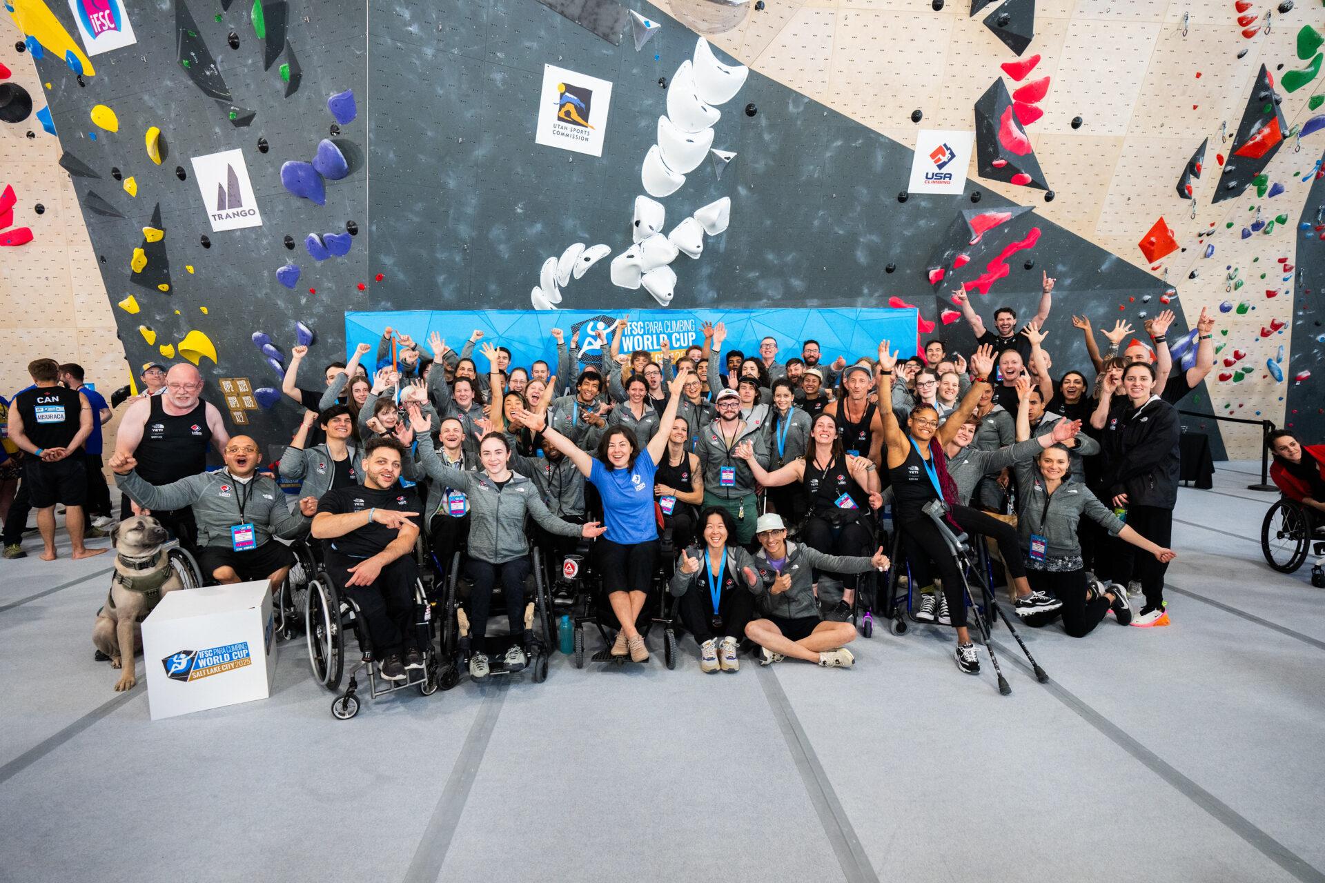 Athletes, coaches, and supporters of Team USA celebrating together at the 2025 IFSC Para World Cup in Salt Lake City